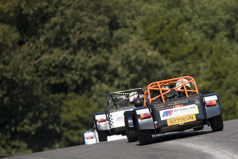 Cars racing over 'The Mountain' at Cadwell Park