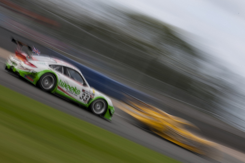 A super blur shot of the Porsche racing the Chevron into Redgate