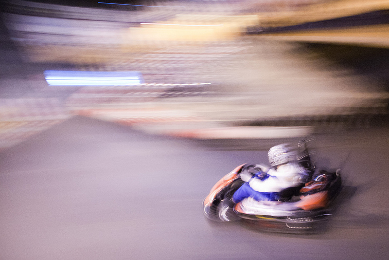 A superblur shot of a kart exiting from under the bridge