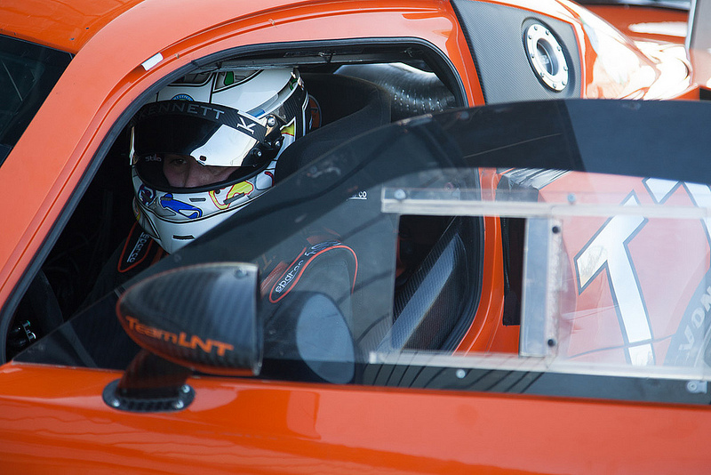 A Ginetta driver sat in a G55 with the door open -Silverstone Photography