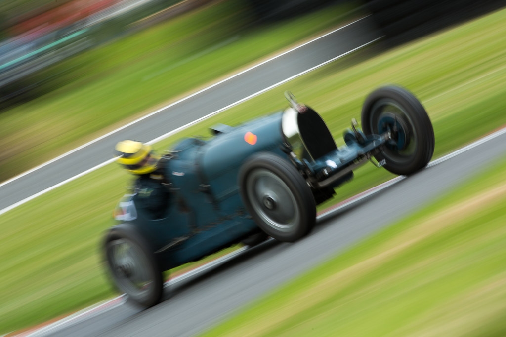 A superblur style shot of a Bugatti at Cadwell Park